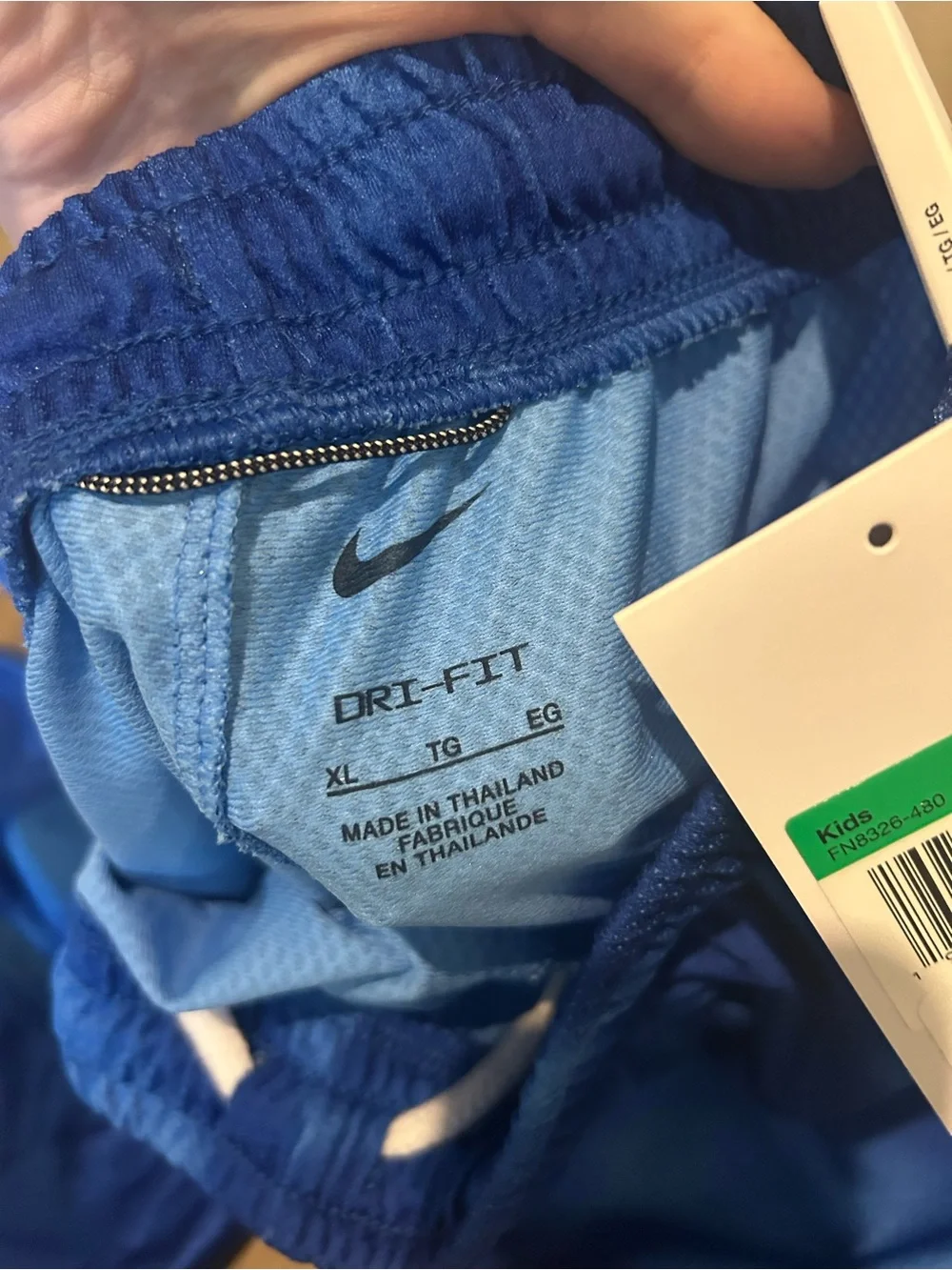 Kids Nike Blue Athletic Shorts with White Swoosh